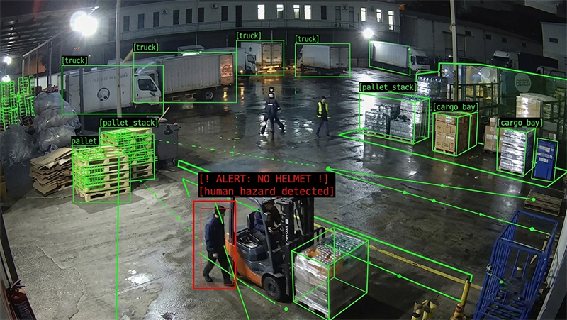 Illustrative nighttime warehouse monitoring with vehicle, pallet, and safety detections