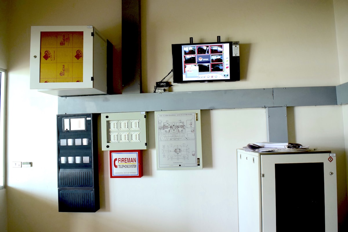 Security operator monitoring a wall of live camera feeds