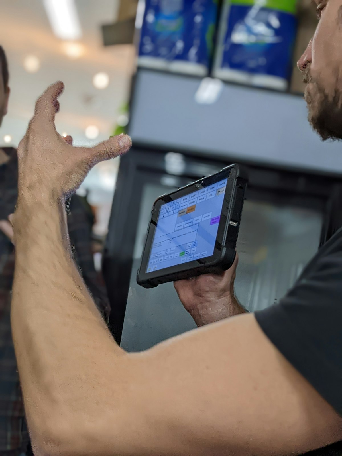 Industrial technician using a rugged tablet on site
